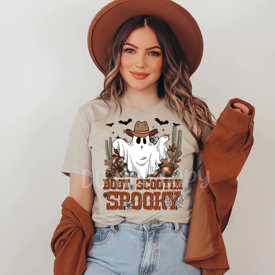 "Boot Scootin' Spooky" T-shirt (shown on "Tan")