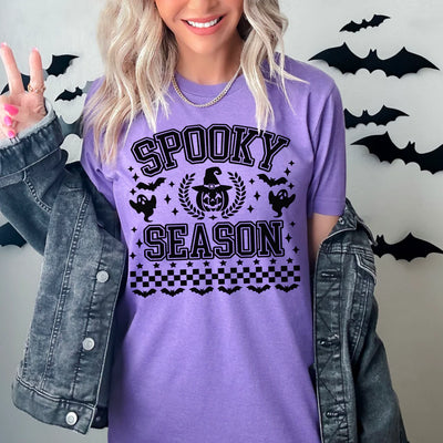 "Spooky Season" T-shirt (shown on "Hthr Team Purple")
